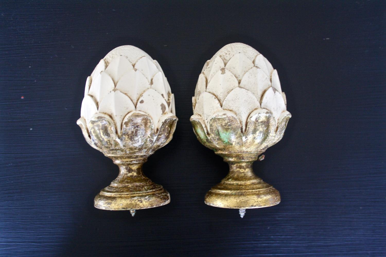 Pair of wooden paintd and gilt finials