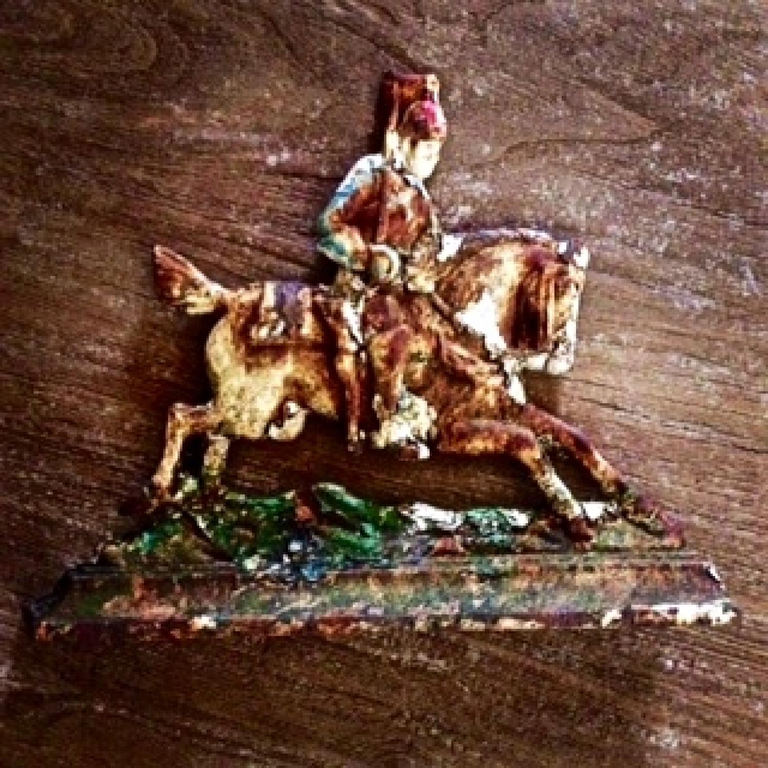 Cast iron doorstop - horse & rider