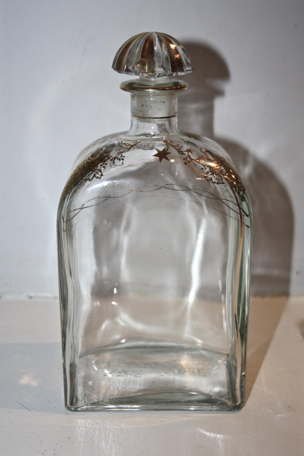 Gilded bottle and stopper