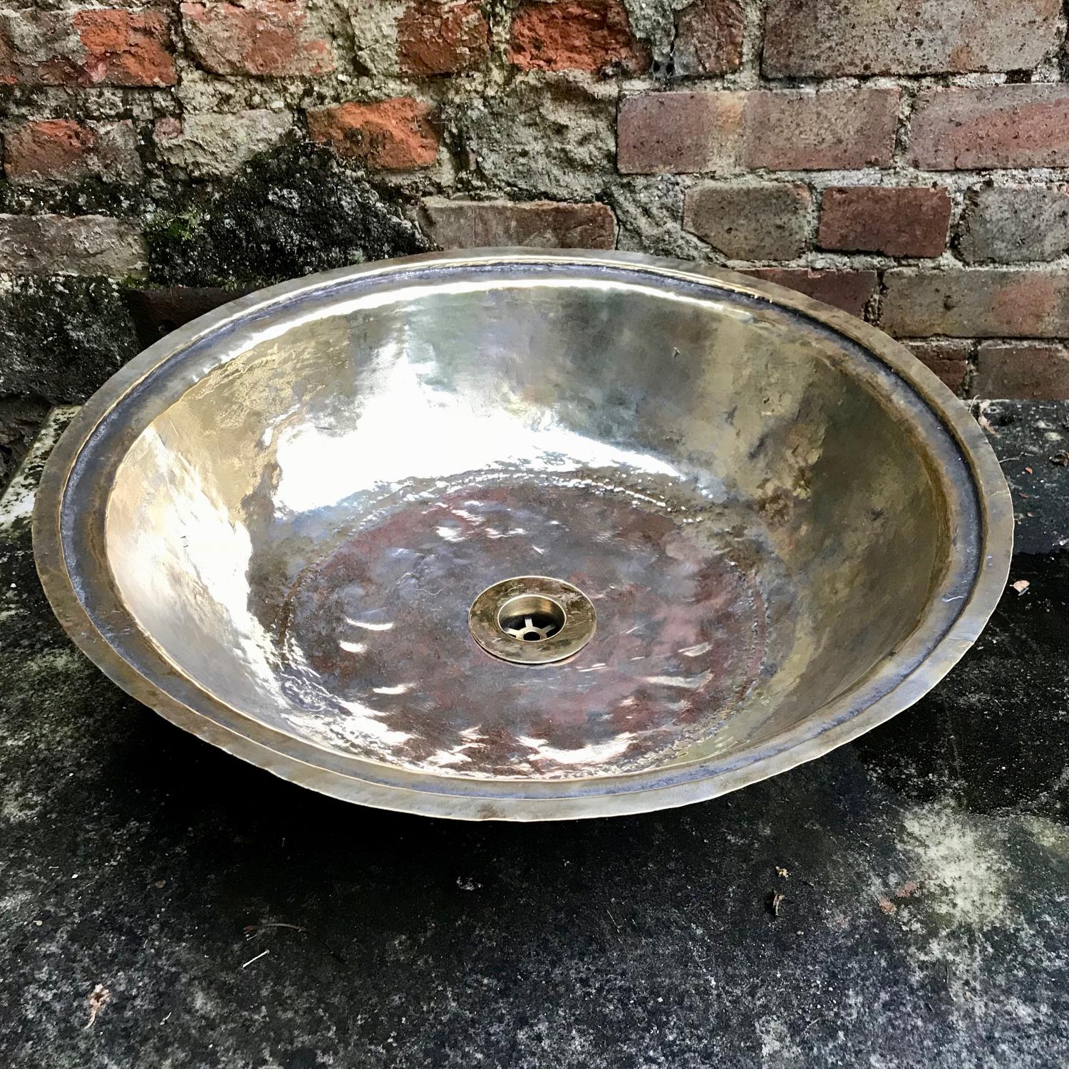 Round brass sink