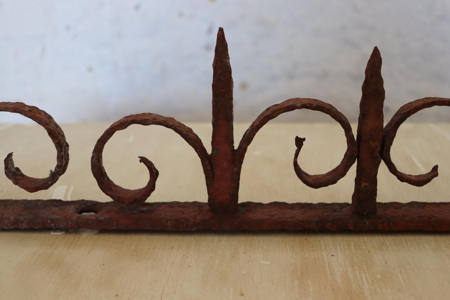 Two ornate Victorian iron railing tops
