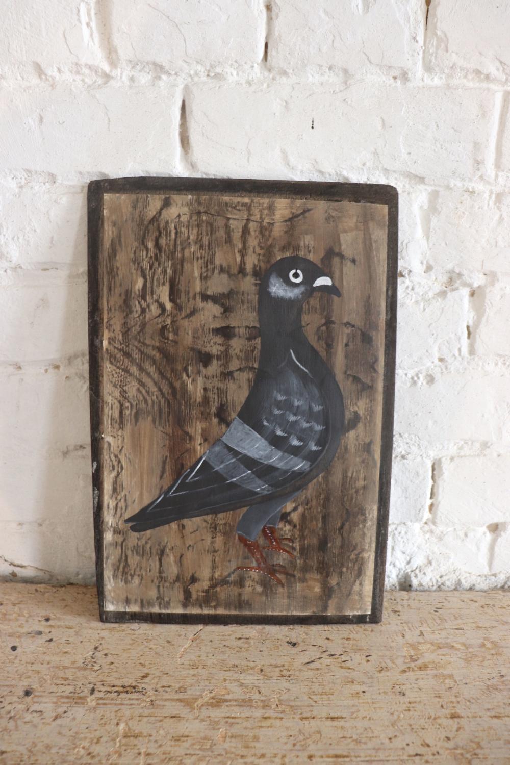 Pigeon painting on wooden board