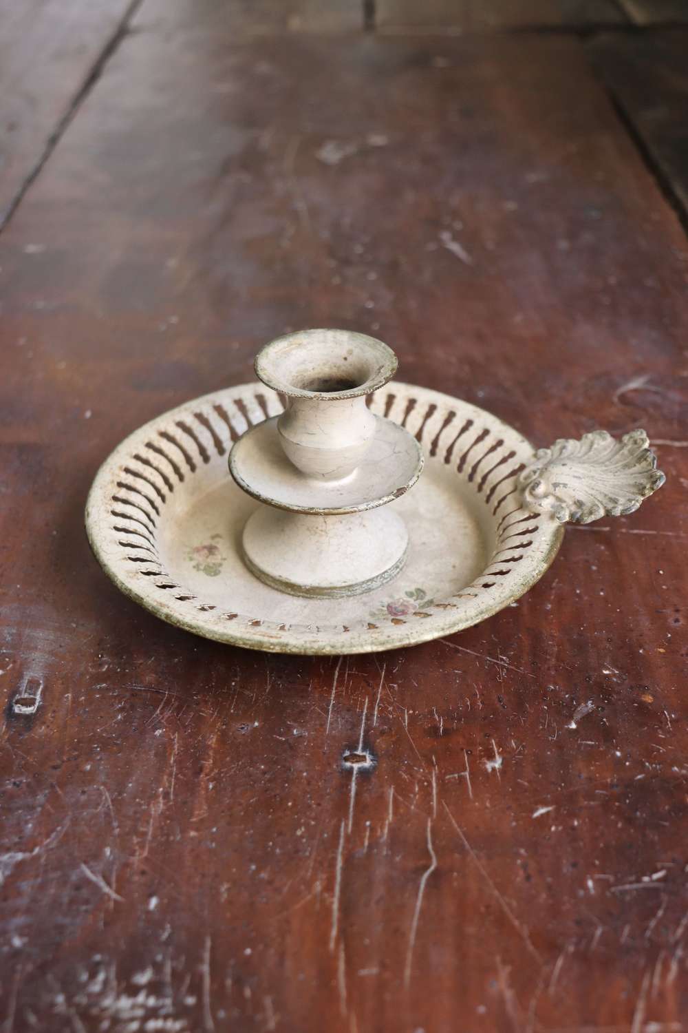Early 20th century toleware candleholder