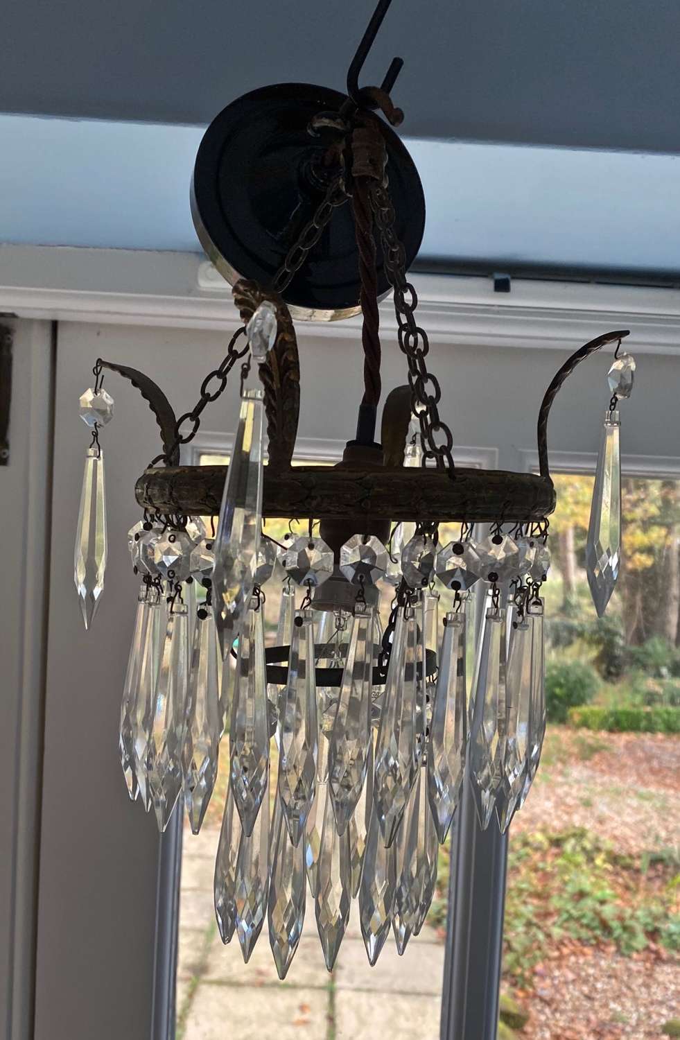 A mid century icicle drop two tier chandelier