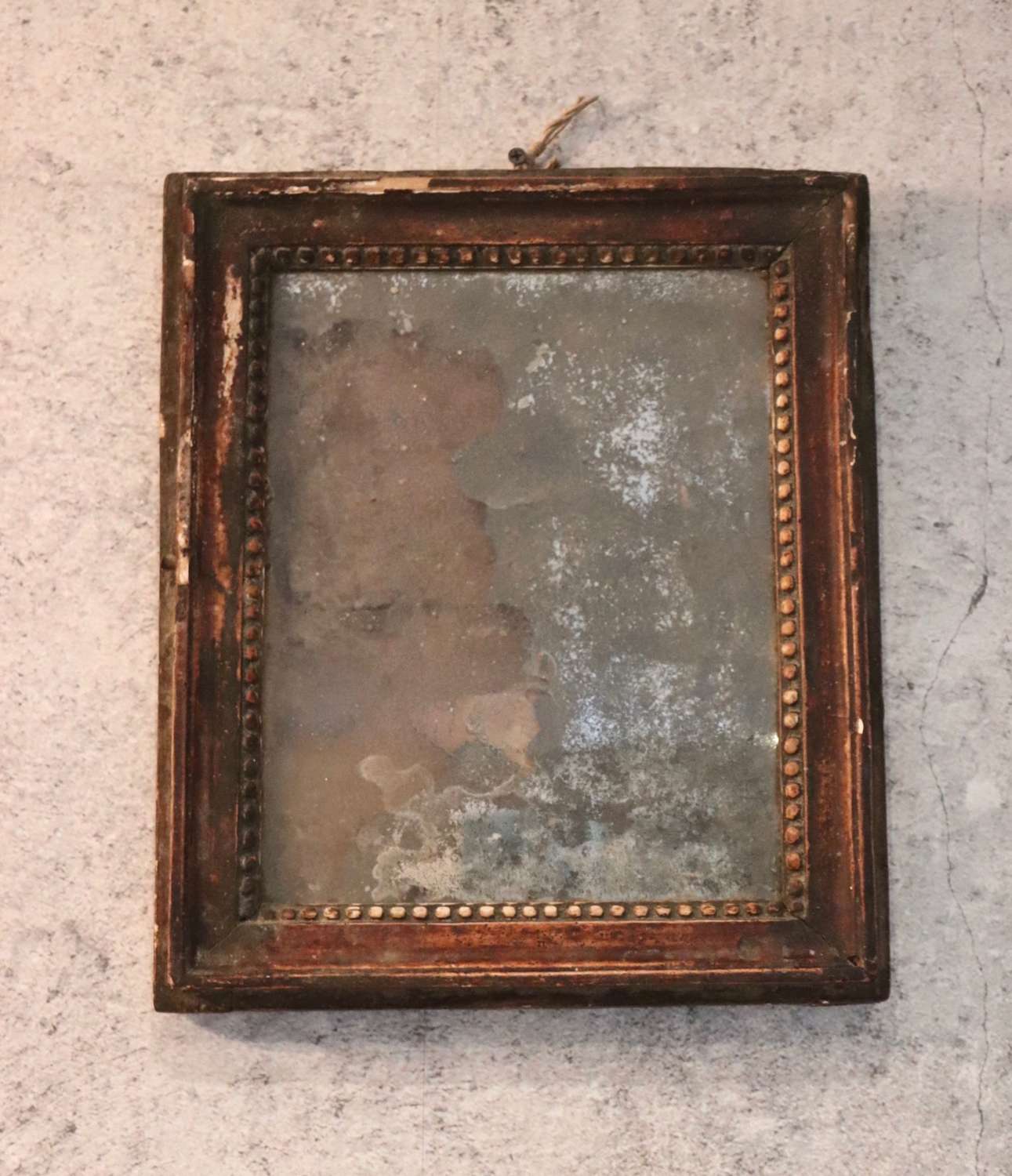 Early 19th century foxed mirror