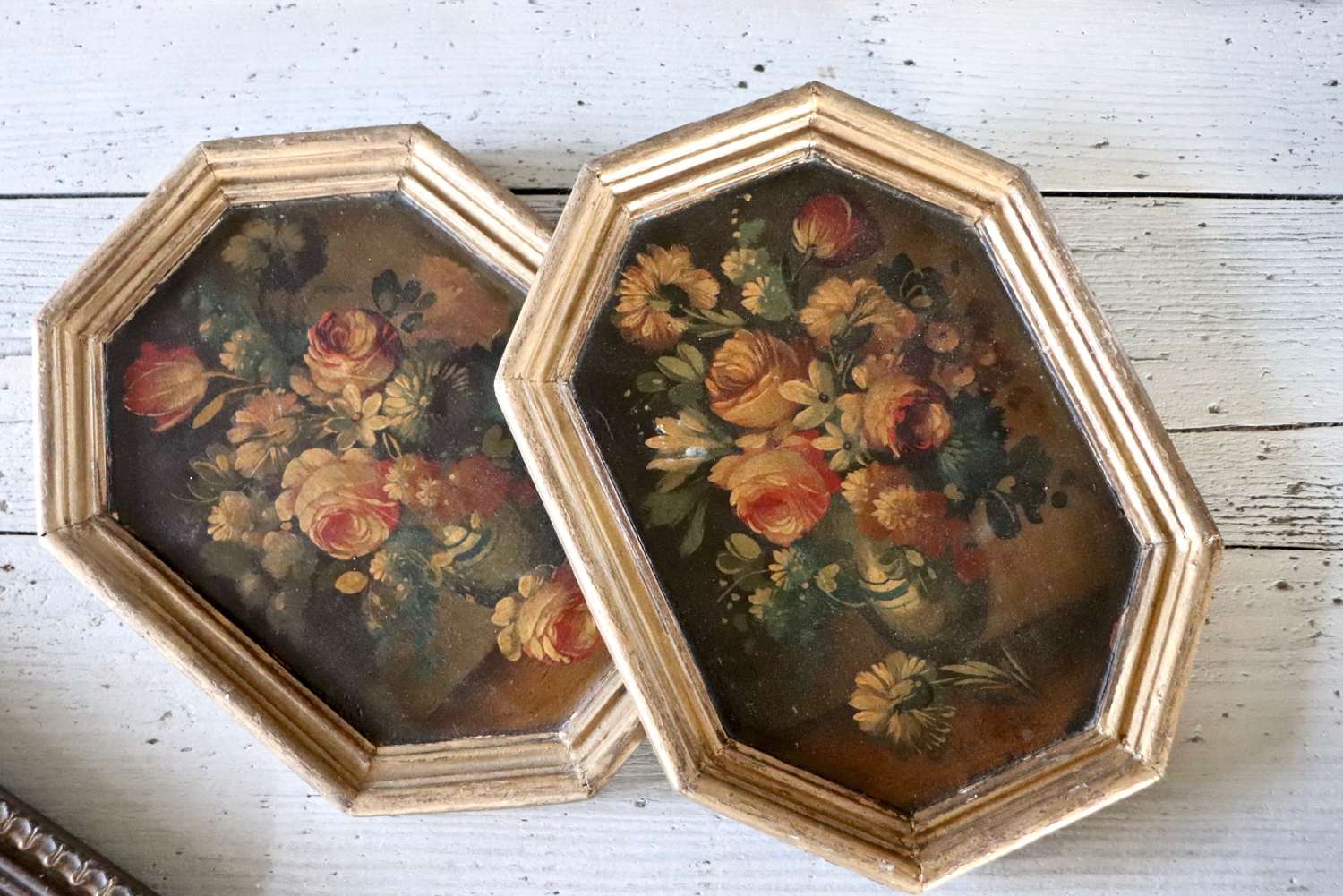 Pair of floral still lifes within gilt frames
