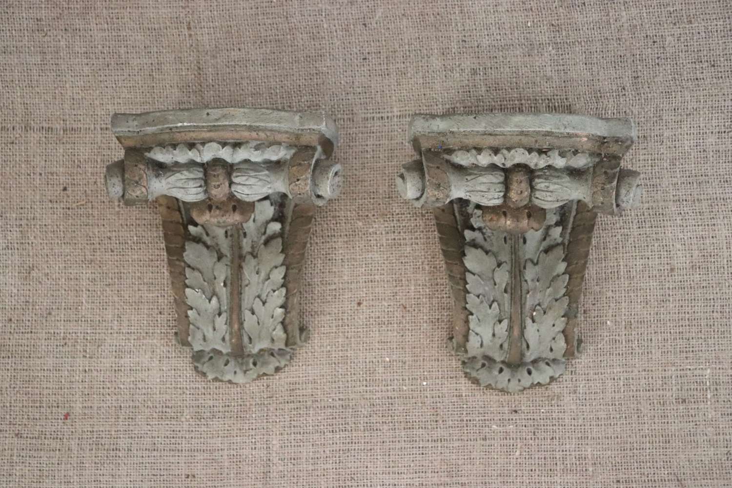 Pair of wooden and plaster corbels
