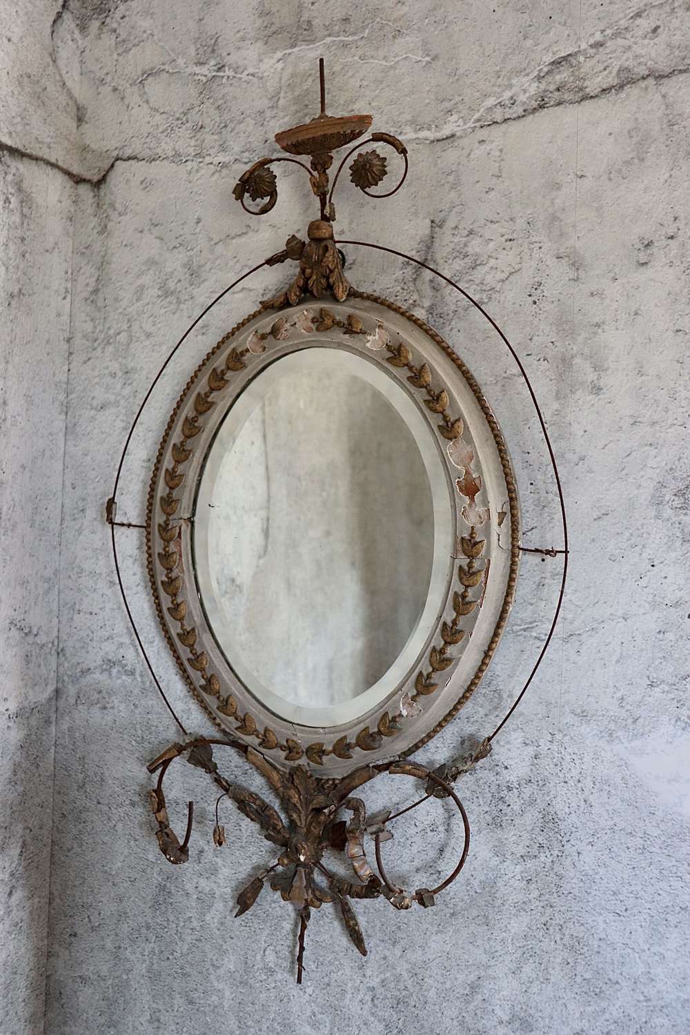Bevelled giro dole mirror with painted and gilt frame