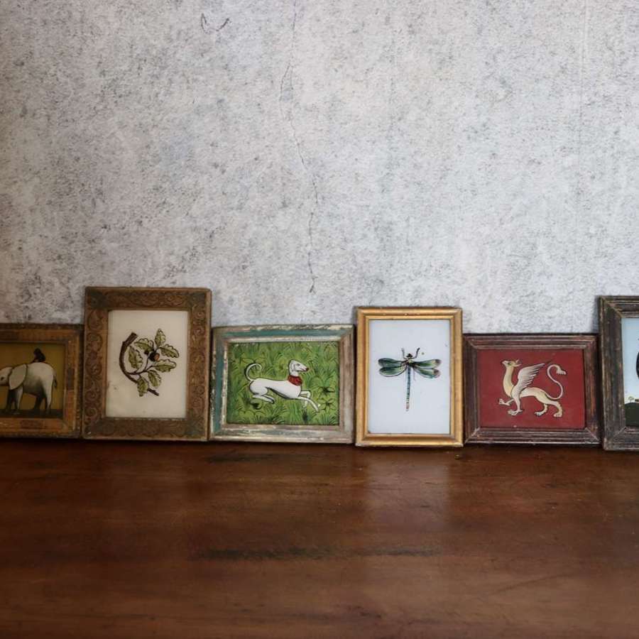 Small Indian reverse glass paintings in antique frames