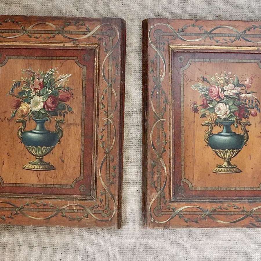Pair of florally painted wooden panels