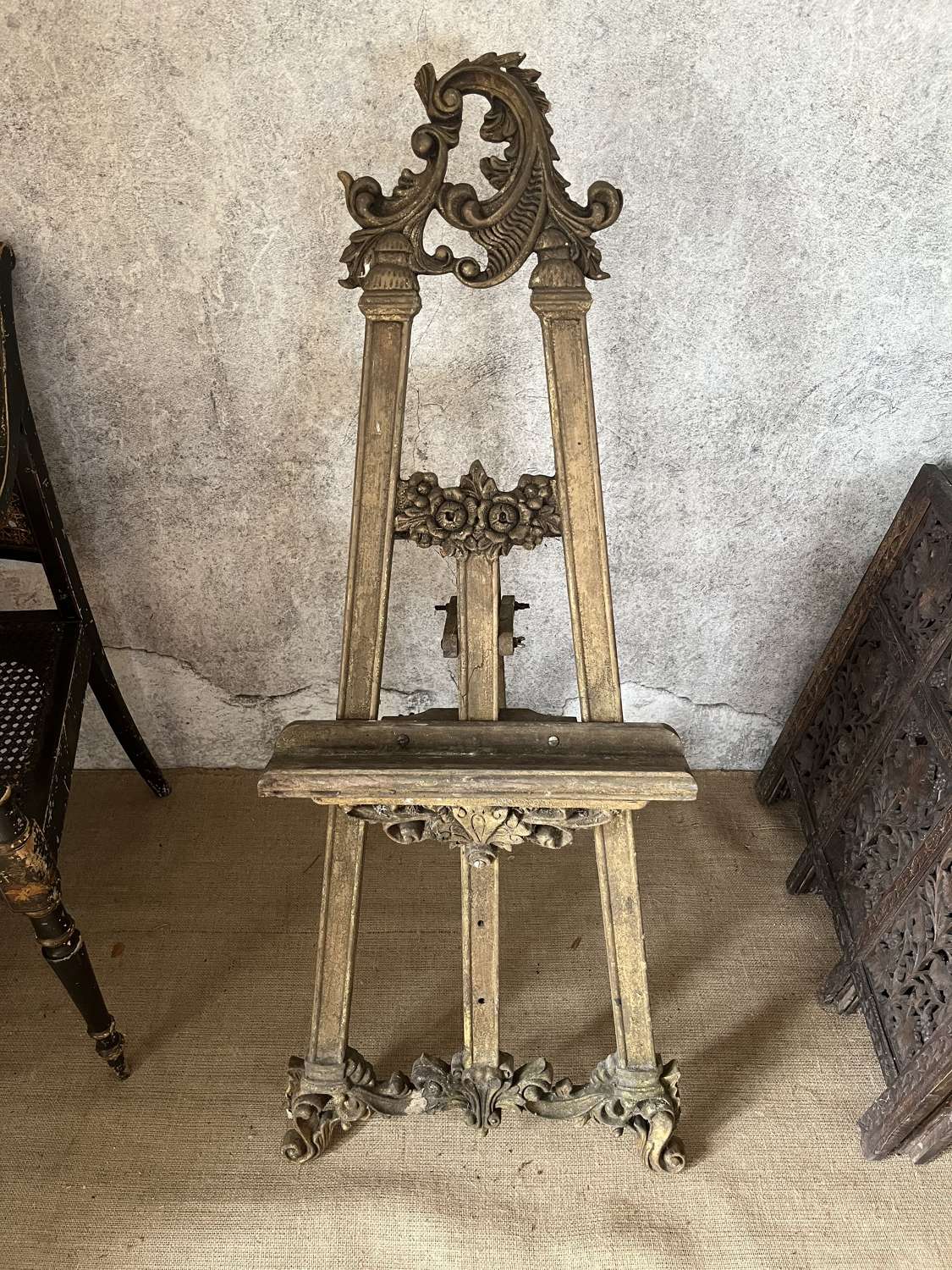 19th century decoratively carved gilt wood easel