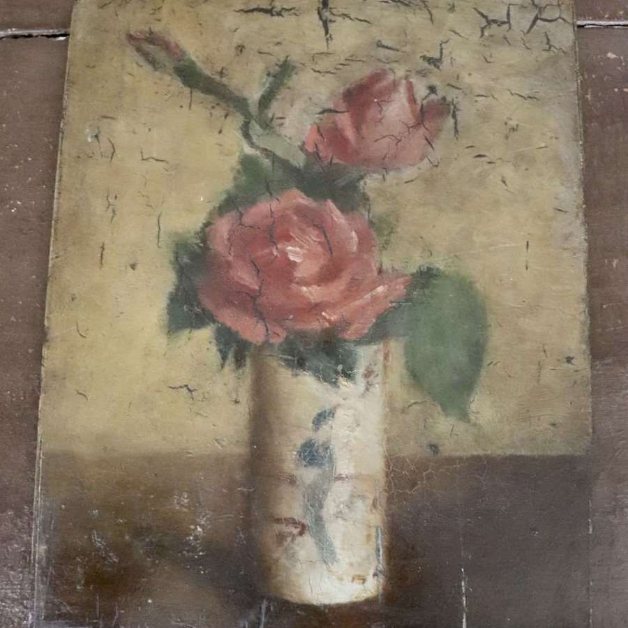 Rose oil on wooden board
