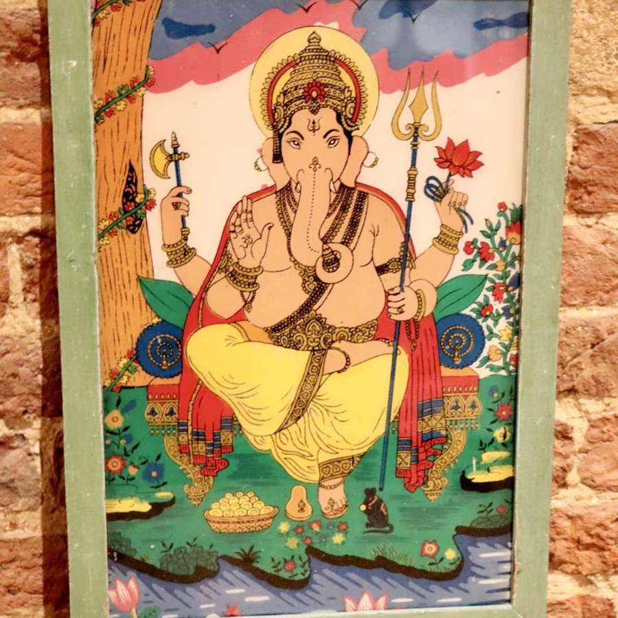 Reverse glass painting of Ganesha